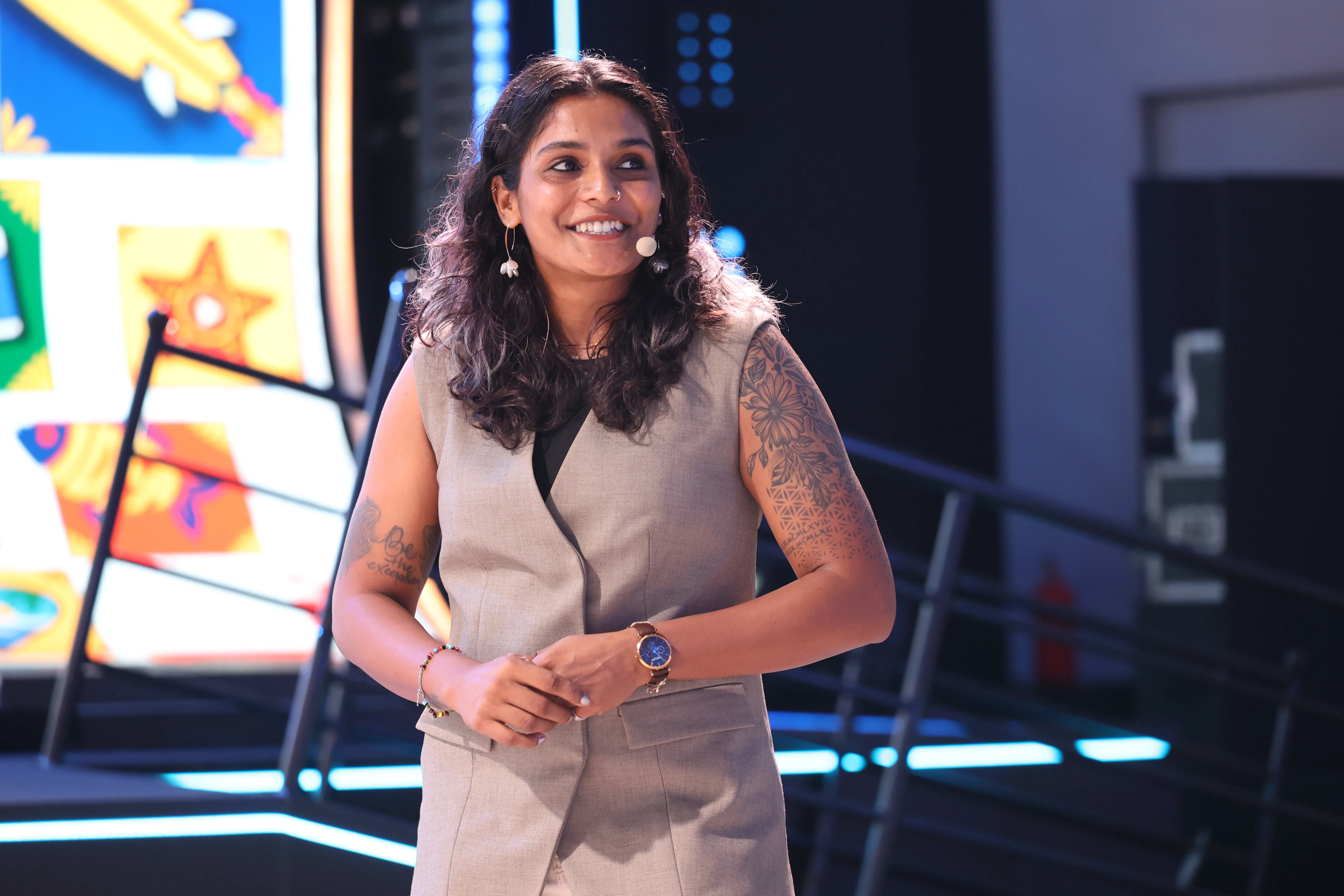 An athlete speaking on stage